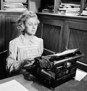 Iris_Joyce_at_work_on_her_typewriter_in_an_office_prior_to_joining_the_Women's_Land_Army_in_1942._D8792